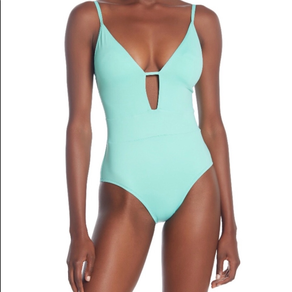 BECCA plunge 1 piece swimsuit. NWT.